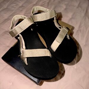 Teva Black and Gold Sandals